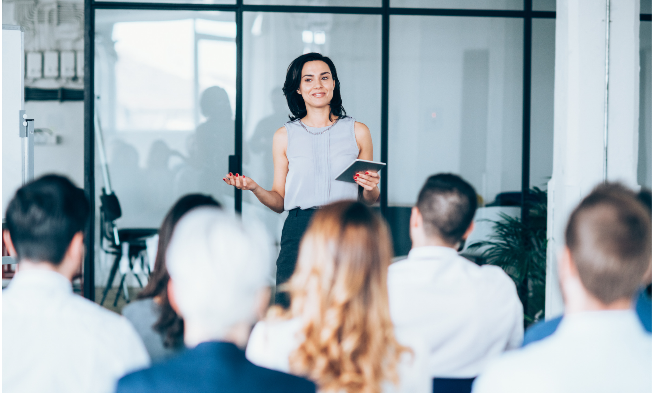 Business professional presenting to funeral staff at a funeral home 