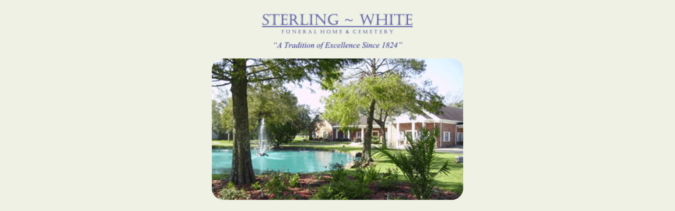 Sterling White Funeral Home and Crematory Chapel outside with trees and a waterfountain 